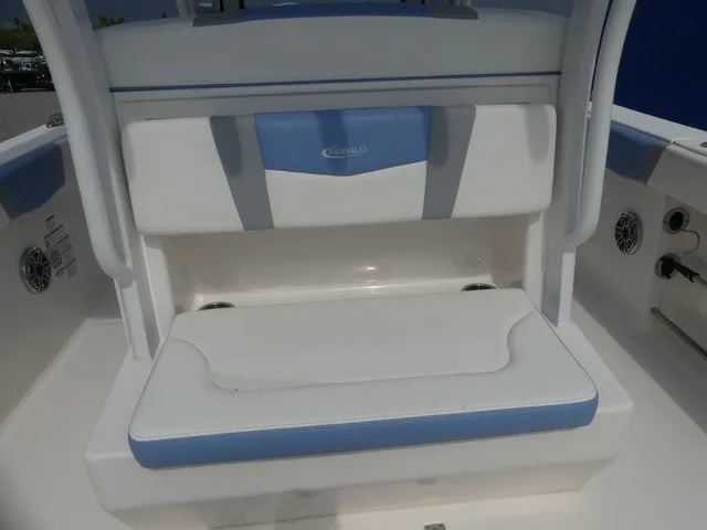 Slide: The Image of The 2022 Robalo R272 Center Console features a cushioned bench seat with blue accents. - 17