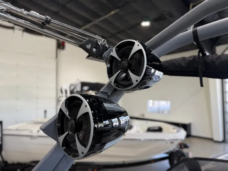 Slide: The Image of Close-up of speakers on a Malibu Wakesetter 24 MXZ, parked indoors. - 22