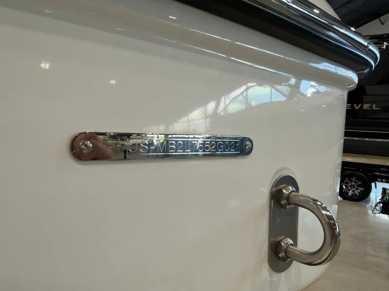 Slide: The Image of Close-up of a 2021 Malibu Wakesetter 24 MXZ hull with serial number. - 26