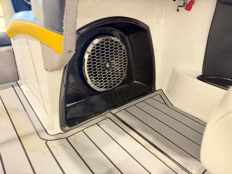Slide: The Image of A speaker is installed in the floor of a 2014 Malibu Wakesetter 24 MXZ. - 22