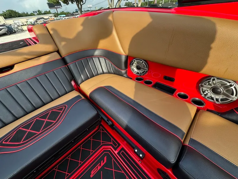 Slide: The Image of The image shows the luxurious interior of a 2023 MB SPORTS B52 boat with stylish seating. - 15
