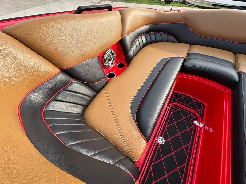 Slide: The Image of The image shows the luxurious interior of a 2023 MB SPORTS B52 boat with elegant seating. - 22