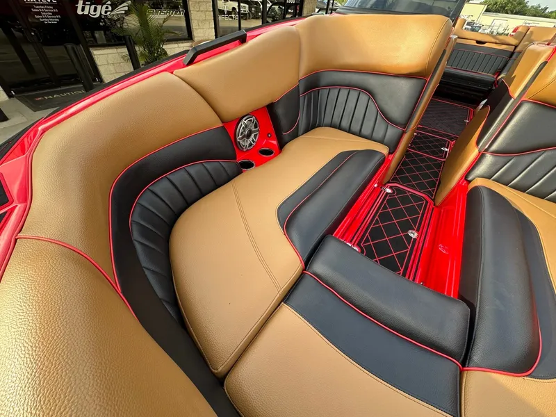 Slide: The Image of The image shows the interior of a 2023 MB SPORTS B52 with sleek leather seating. - 25