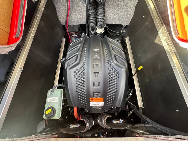Slide: The Image of The engine compartment of a 2023 MB SPORTS B52 features a Raptor 440 engine. - 37
