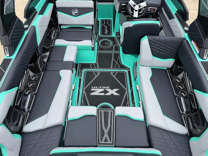 Slide: The Image of Interior of the 2025 Tigé Ultré 23ZX with modern seating and stylish design. - 9