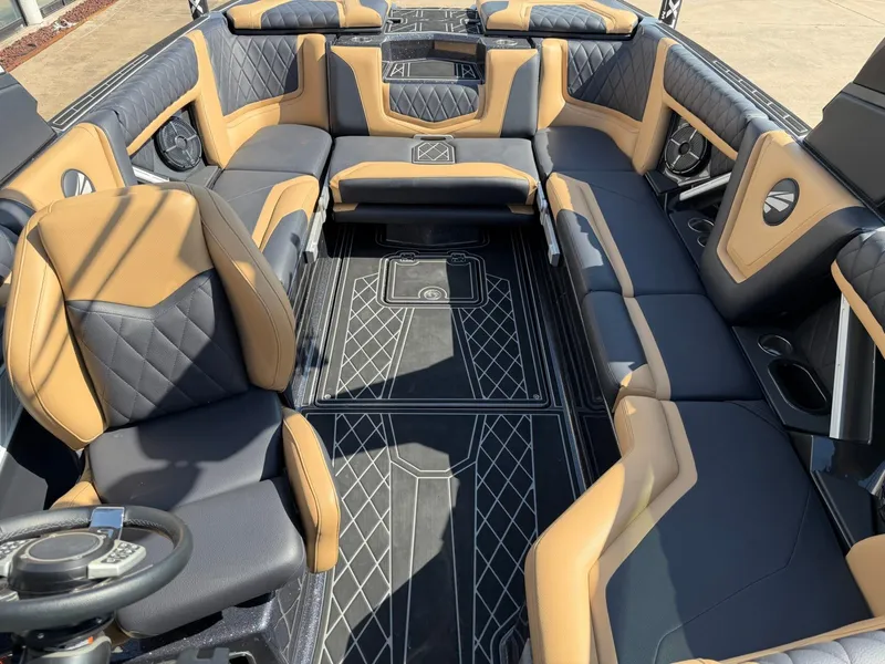 Slide: The Image of Interior of a 2022 Tigé 25ZX with luxurious seating and modern design. - 19