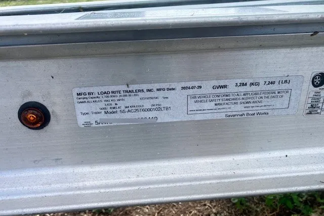 Slide: The Image of Label on Load Rite trailer, model Savannah 220 IS, 2025, showing manufacturing details and specifications. - 10