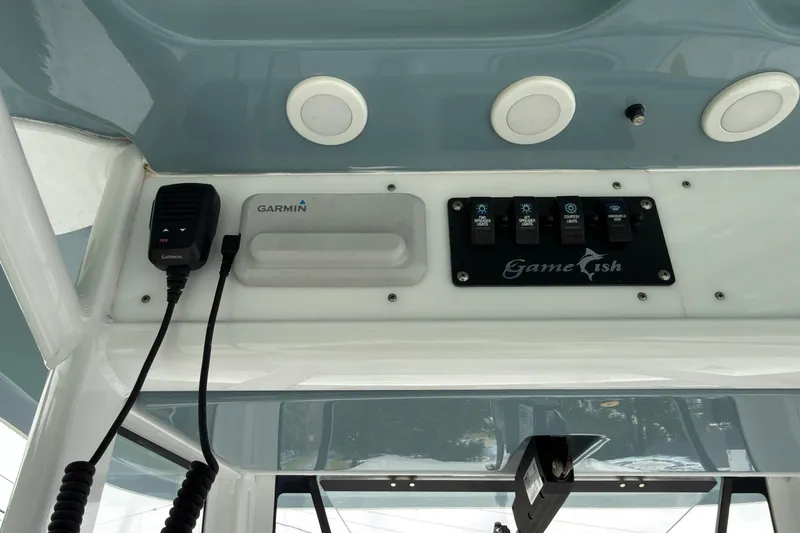 Slide: The Image of Control panel of a 2019 Sea Hunt Gamefish 27 boat with Garmin equipment. - 26