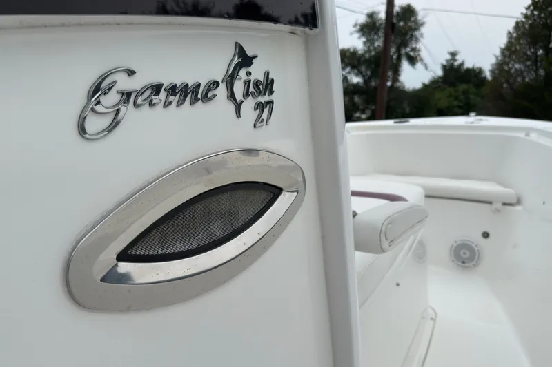 Slide: The Image of 2019 Sea Hunt Gamefish 27 boat interior with logo detail. - 8