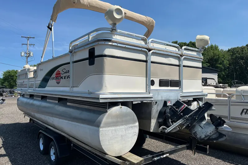 Slide: The Image of 2000 Sun Tracker Party Barge 22 I/O Regency Edition pontoon boat on trailer. - 2
