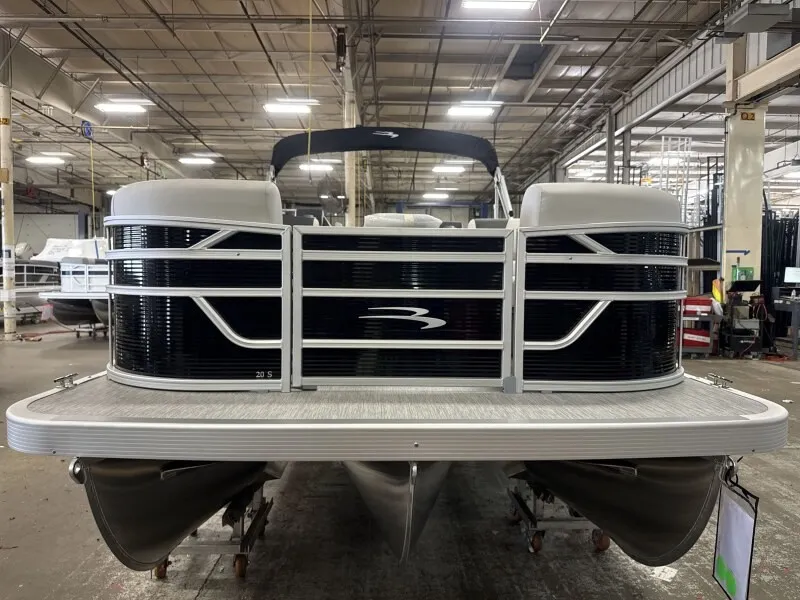 Slide: The Image of Bennington 20 S1 STERN RADIUS pontoon boat in a warehouse. - 3