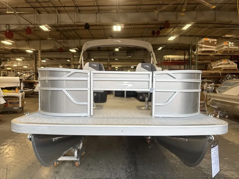 Slide: The Image of 2027 Bennington 20 S1 4 PT FISHING pontoon boat in a warehouse. - 5