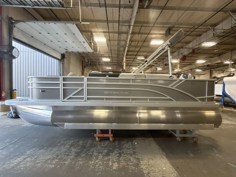 Slide: The Image of Bennington 20 S1 4 PT FISHING pontoon boat in a warehouse. - 5