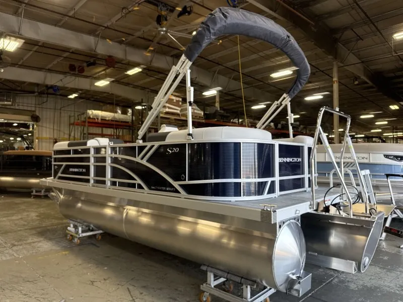 Slide: The Image of Bennington 20 S1 STERN RADIUS pontoon boat in a warehouse. - 5