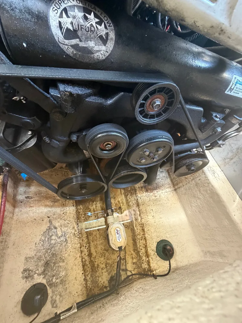 Slide: The Image of Close-up of an engine compartment with pulleys and belts mounted on a Monterey 288SS Super Sport. - 18