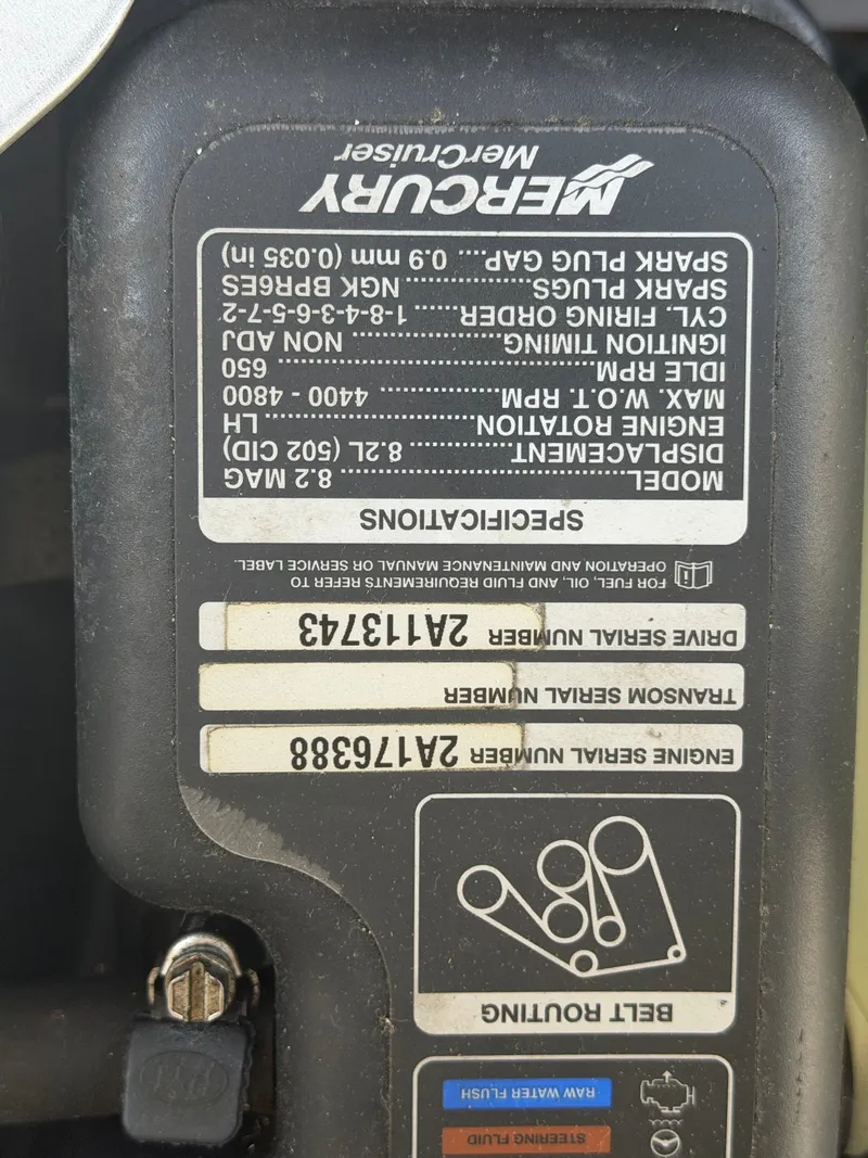 Slide: The Image of Close-up of a Mercury engine part with technical specifications and serial numbers. - 19