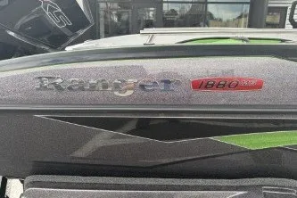 Slide: The Image of 2026 Ranger 1880MS boat with sleek design and branding details. - 8