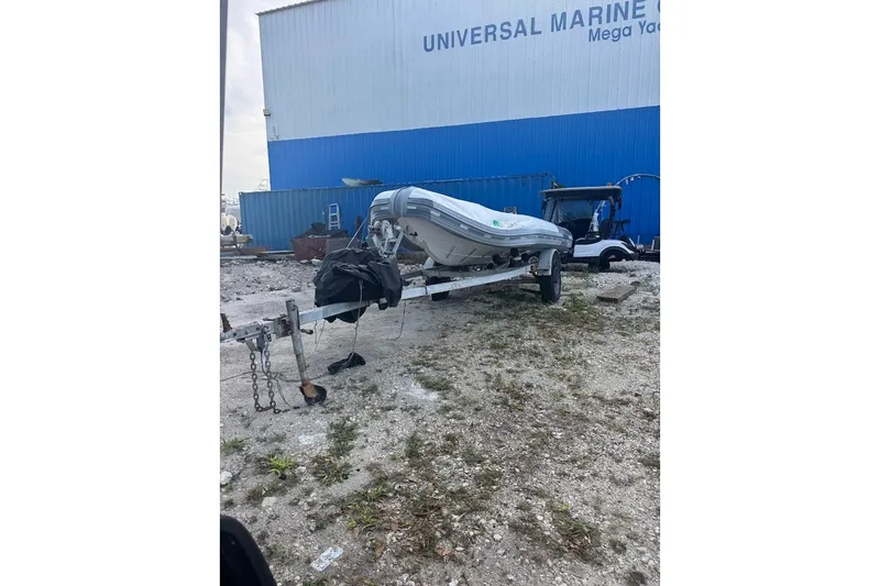 The Image of Boat on trailer at Universal Marine, Embarkation Polymer model, 2011, outdoor storage area. - 1