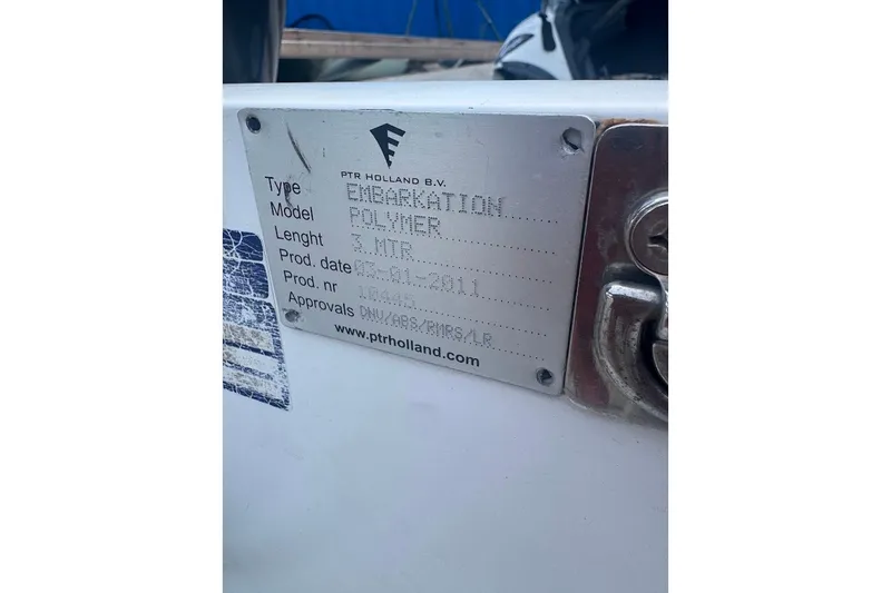 Slide: The Image of Metal identification plate on Embarkation Polymer model, dated 2011, by PTR Holland B.V. - 4