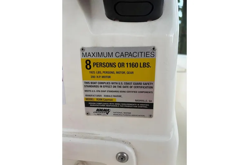 Slide: The Image of Capacity label on 2014 Robalo 206 Cayman boat, max 8 persons or 1160 lbs. - 20