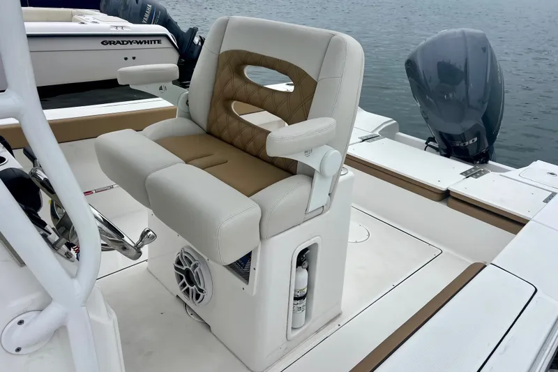 Slide: The Image of Luxury seating on a 2021 Release 240 RX boat with Yamaha outboard motor. - 10