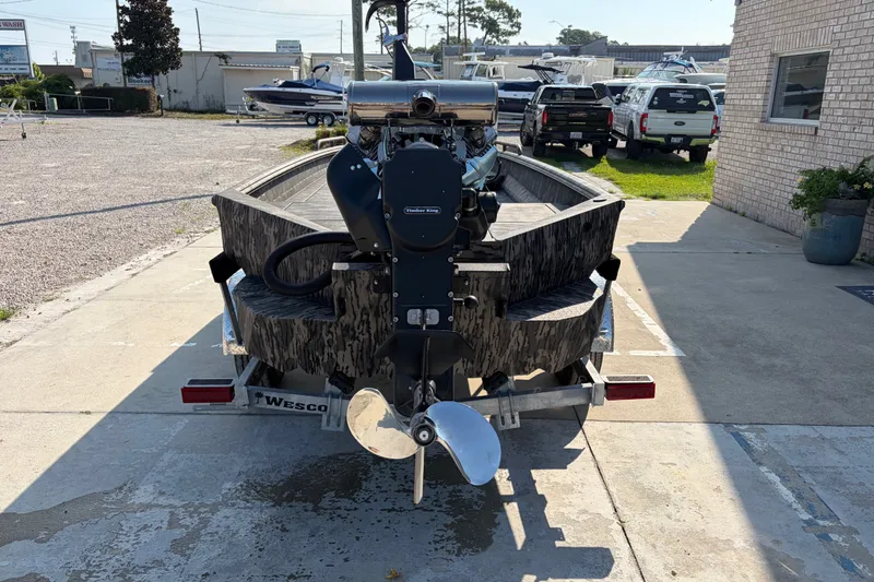 Slide: The Image of Rear view of a 2026 Havoc 1756 MSTC boat on a trailer in a parking lot. - 3