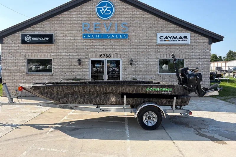 The Image of 2026 Havoc 1756 MSTC boat on trailer at Revis Yacht Sales dealership. - 1