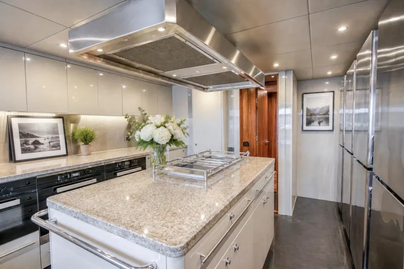 Slide: The Image of Luxurious kitchen interior on 2014 Sunseeker 131 Yacht with modern appliances and elegant decor. - 38