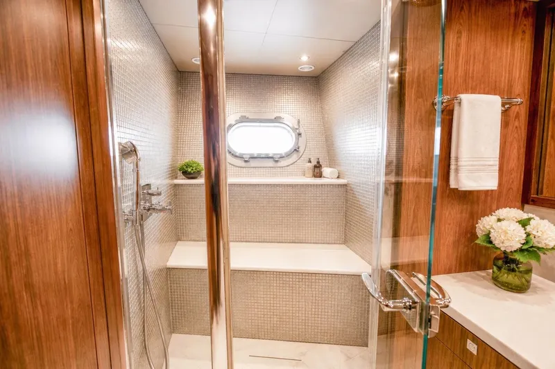 Slide: The Image of Luxurious bathroom on 2014 Sunseeker 131 Yacht with elegant wood and glass accents. - 42