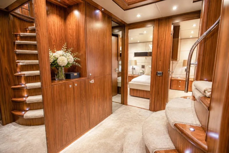 Slide: The Image of Luxurious interior of 2014 Sunseeker 131 Yacht with elegant wood paneling and plush carpeting. - 46