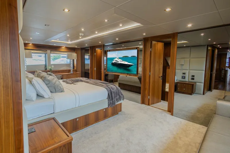 Slide: The Image of Luxurious bedroom interior of 2014 Sunseeker 131 Yacht with elegant wood finishes. - 53