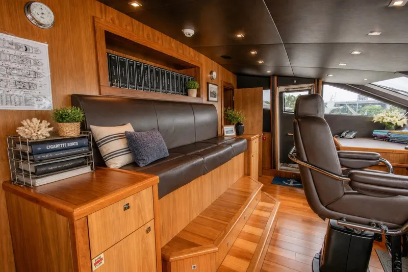 Slide: The Image of Luxurious interior of 2014 Sunseeker 131 Yacht with leather seating and wooden accents. - 24