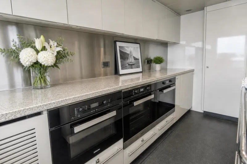Slide: The Image of Luxurious kitchen interior on 2014 Sunseeker 131 Yacht with modern appliances and elegant decor. - 39