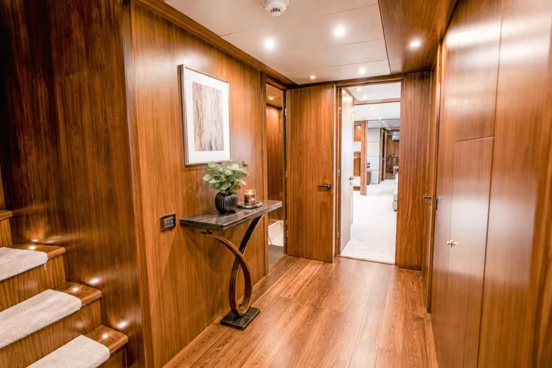 Slide: The Image of Luxurious interior of 2014 Sunseeker 131 Yacht with elegant wood paneling and modern decor. - 20