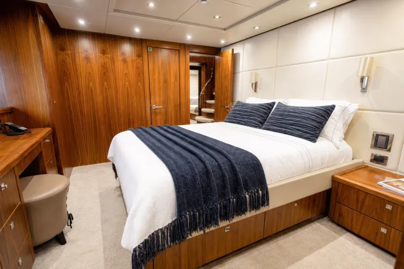 Slide: The Image of Luxurious bedroom interior on 2014 Sunseeker 131 Yacht with elegant wood finishes. - 40