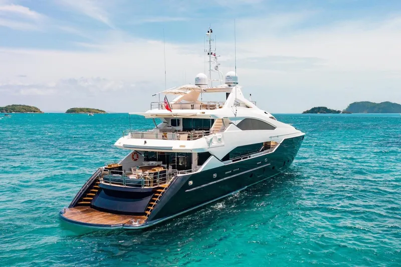 Slide: The Image of Luxurious 2014 Sunseeker 131 Yacht cruising in clear blue waters. - 3