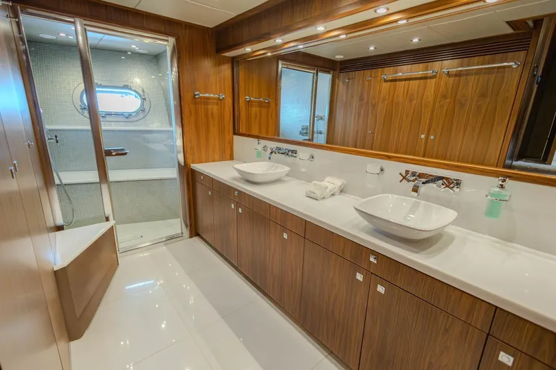 Slide: The Image of Luxurious bathroom on 2014 Sunseeker 131 Yacht with dual sinks and modern shower. - 54
