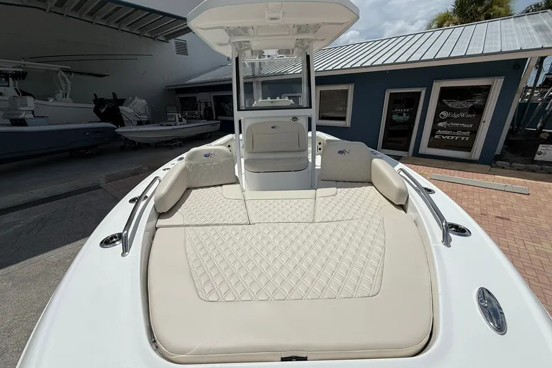 Slide: The Image of 2027 Crevalle 24 HCO boat with spacious seating and modern design. - 25