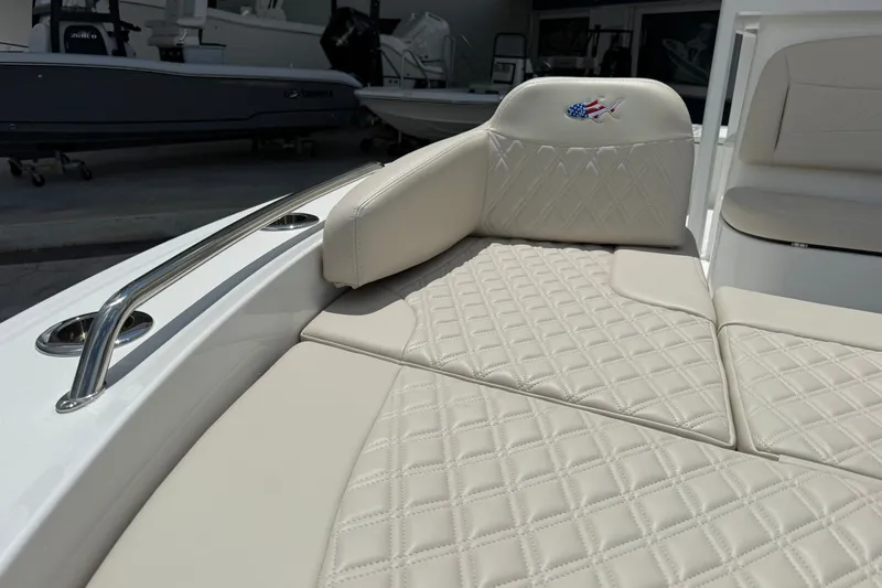 Slide: The Image of Luxurious seating on 2027 Crevalle 24 HCO boat with diamond-stitched upholstery. - 26