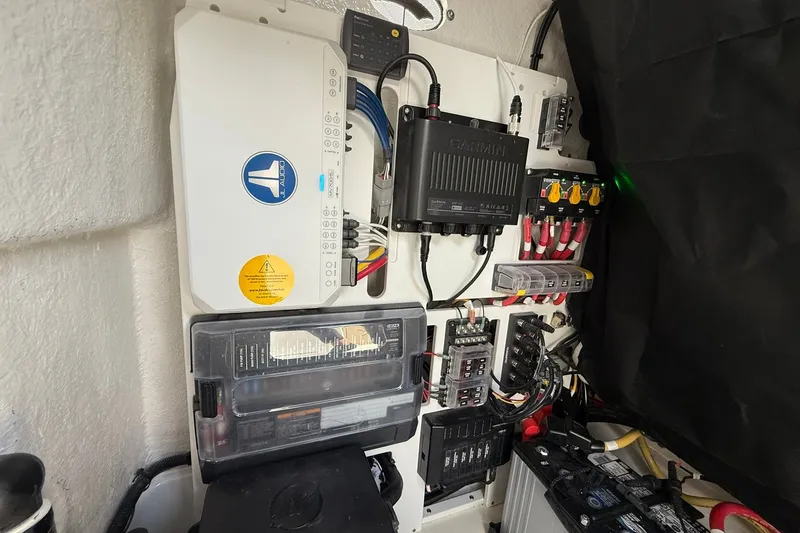 Slide: The Image of Electrical system setup in a 2027 Crevalle 24 HCO boat, featuring JL Audio and Garmin components. - 30