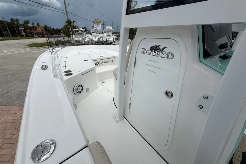 Slide: The Image of Crevalle 24 HCO 2027 boat, showcasing sleek design and spacious deck. - 19