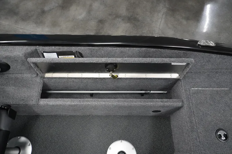 Slide: The Image of Interior view of 2027 Tracker Pro Guide V-16 WT boat storage compartment. - 8