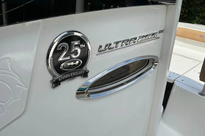 Slide: The Image of 2021 Sea Hunt Ultra 255SE boat with 25th anniversary emblem. - 42