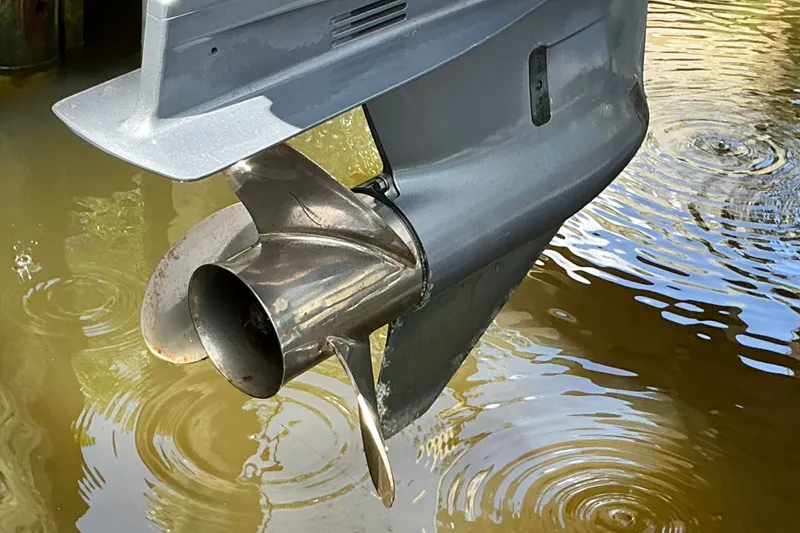 Slide: The Image of Close-up of a 2021 Sea Hunt Ultra 255SE boat propeller in water. - 41