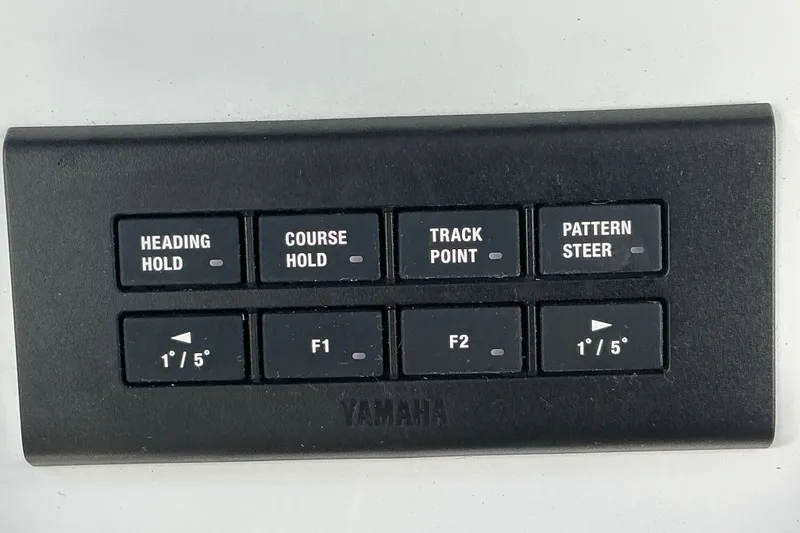 Slide: The Image of Yamaha control panel with buttons for course and pattern steering. - 27