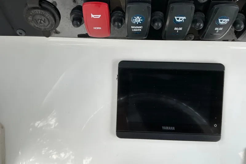 Slide: The Image of Control panel of a 2021 Sea Hunt Ultra 255SE boat with Yamaha display. - 4