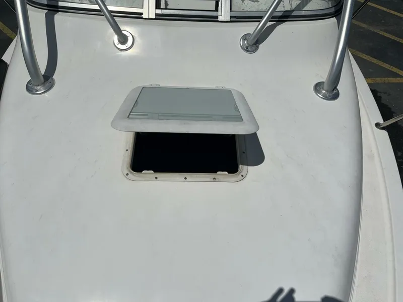 Slide: The Image of Open deck hatch on a 2006 Century 2400 Walk-Around boat. - 15