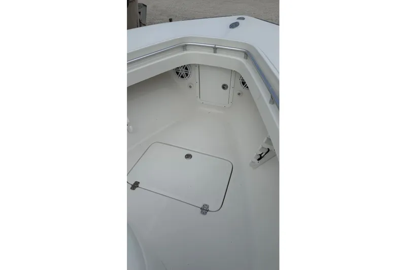 Slide: The Image of 2007 SeaCraft SC 32 Master Angler boat interior, featuring storage compartment and sleek design. - 20
