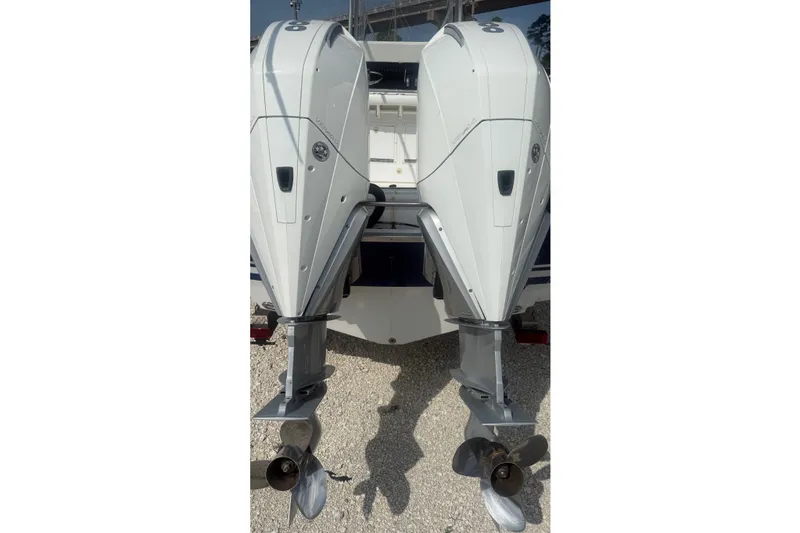 Slide: The Image of Twin outboard engines on a 2007 SeaCraft SC 32 Master Angler boat. - 4