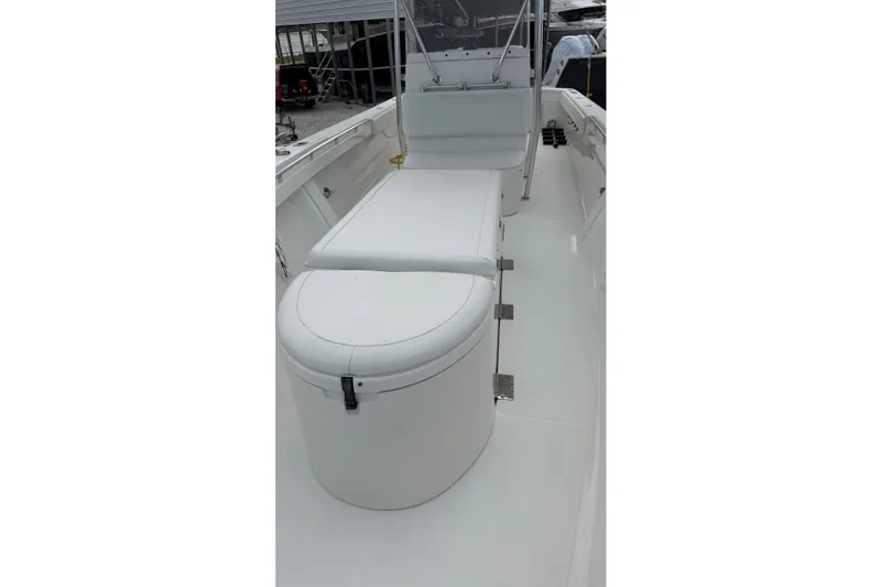 Slide: The Image of 2007 SeaCraft SC 32 Master Angler boat interior with white seating and storage. - 23